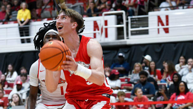 Razorbacks' Joseph Pinion going up for a shot in Red-White game at Barnhill Arena